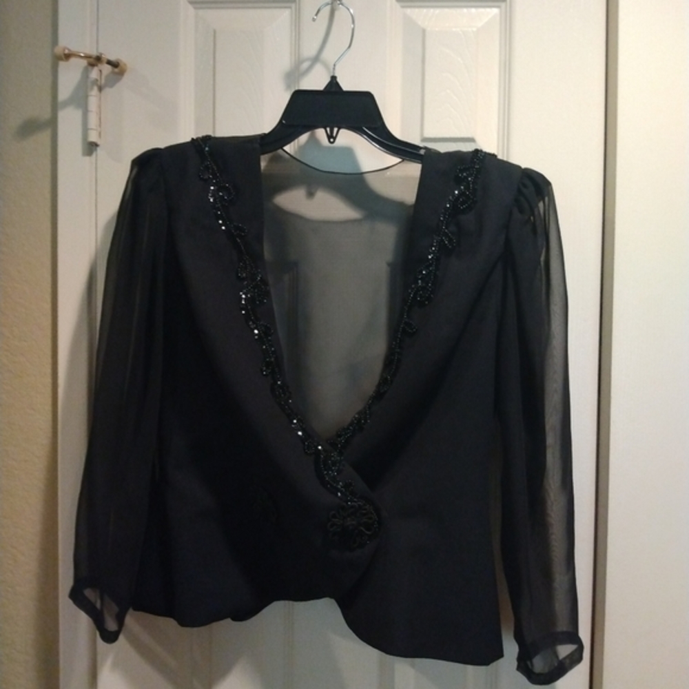 Beautiful sequin blouse, sheer back with low back w/bowtie and sheer sleeves